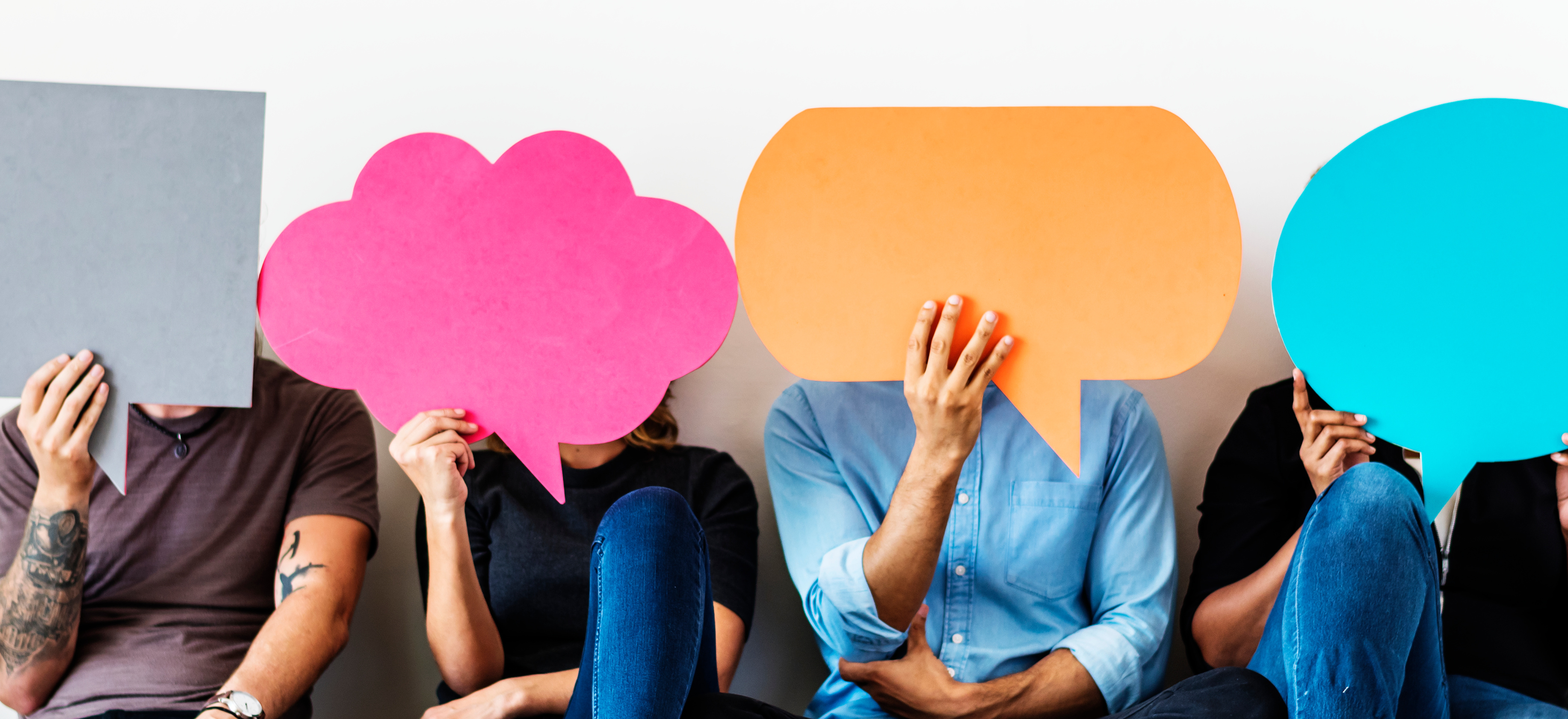 Group of diverse people with speech bubbles icons