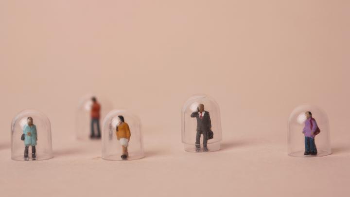 no contact concept miniature people in the shield