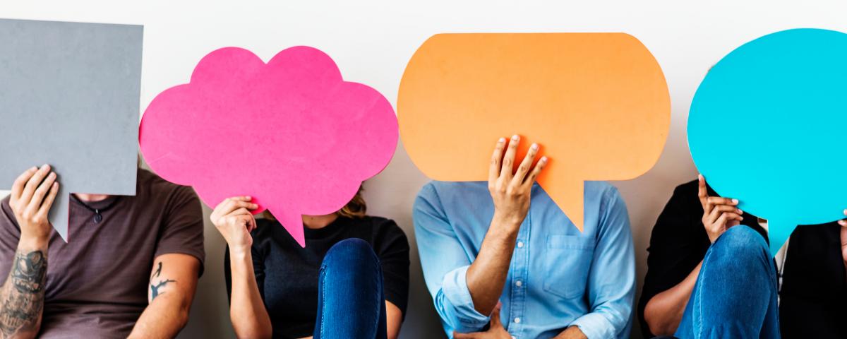 Group of diverse people with speech bubbles icons