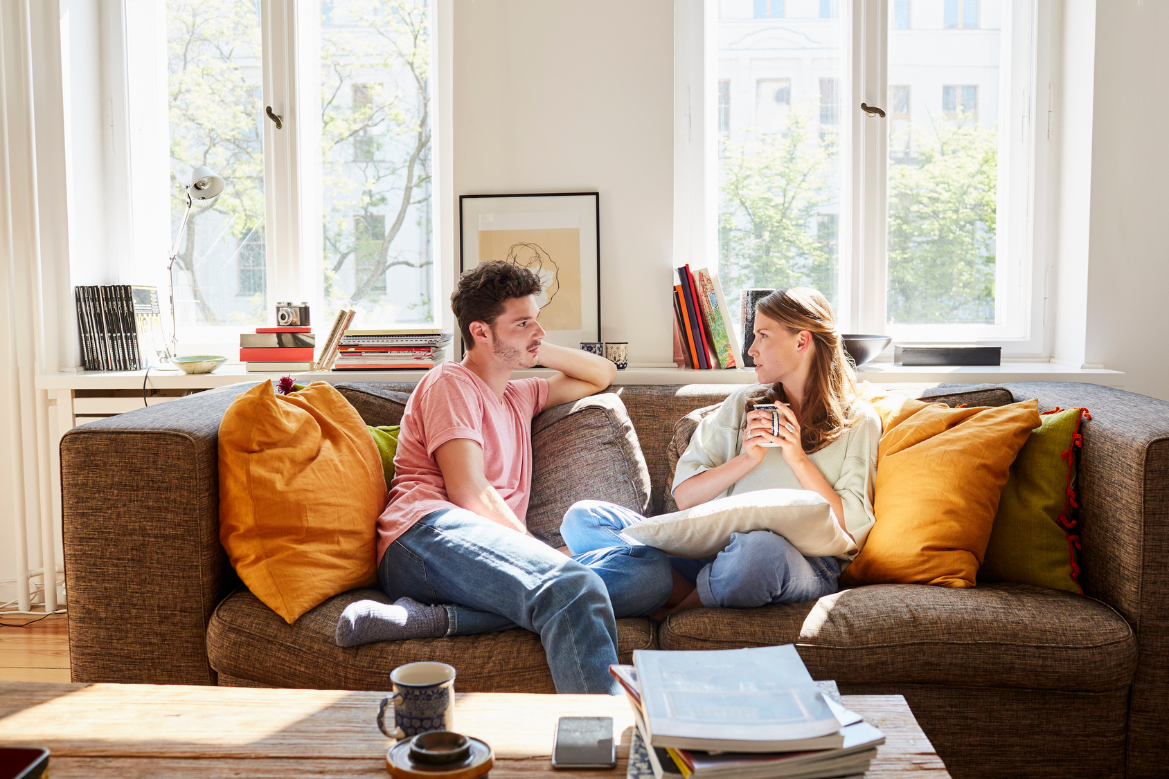 Couple Talking on Couch