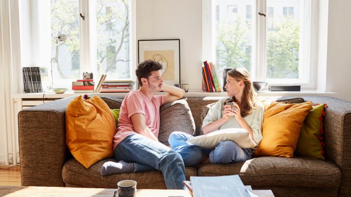 Couple Talking on Couch