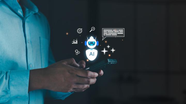Hands holding a smartphone with AI chatbot. digital graphs, gears, targets, and a speech bubble, mobile artificial intelligence assistance, personal cognition, and business analytics