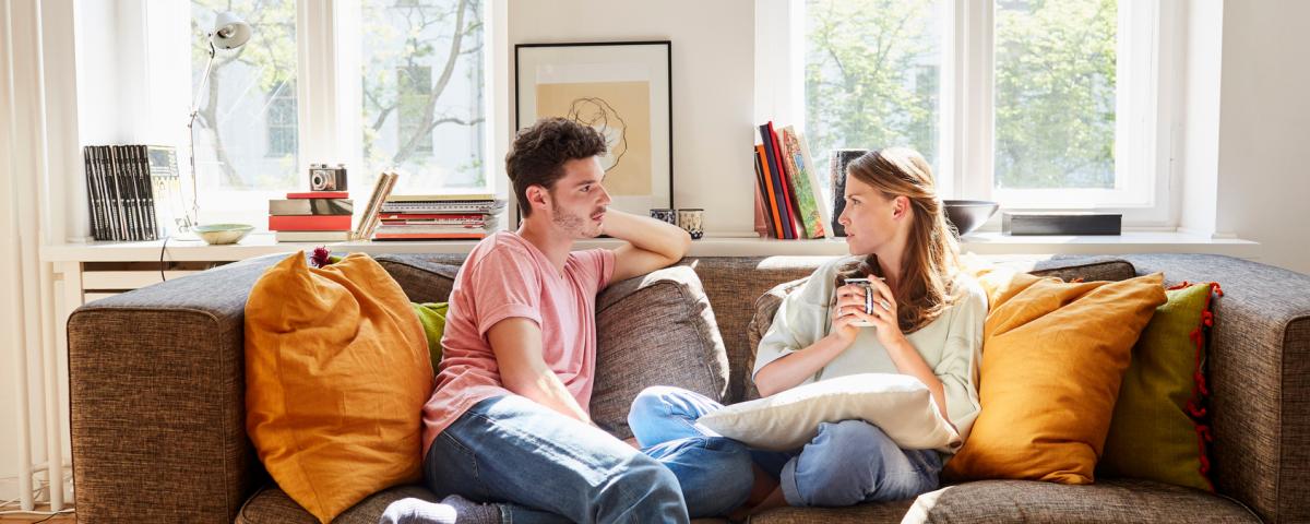 Couple Talking on Couch