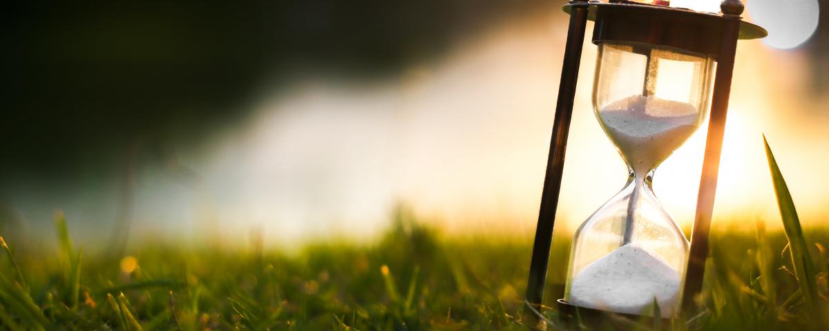 hourglass in the grass