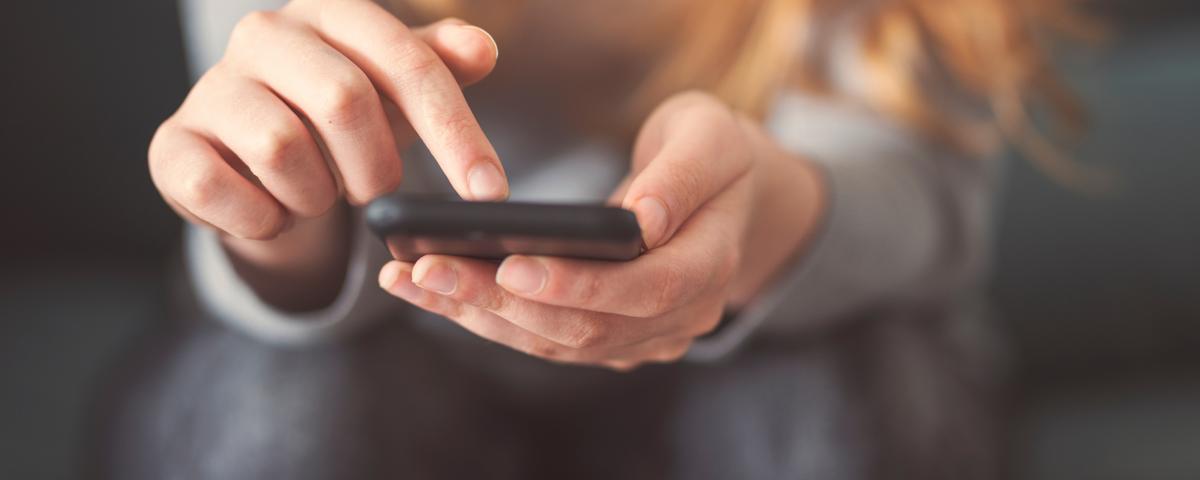 girl looking at phone