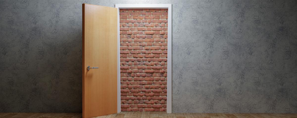 brick wall behind door